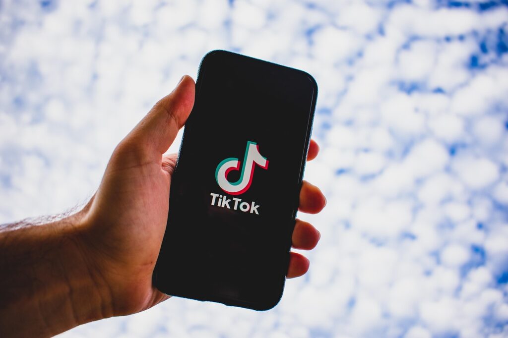 Image showing a hand about to pay for TikTok ads in Nigeria
